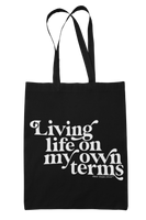 'living life on my own terms' tote bag